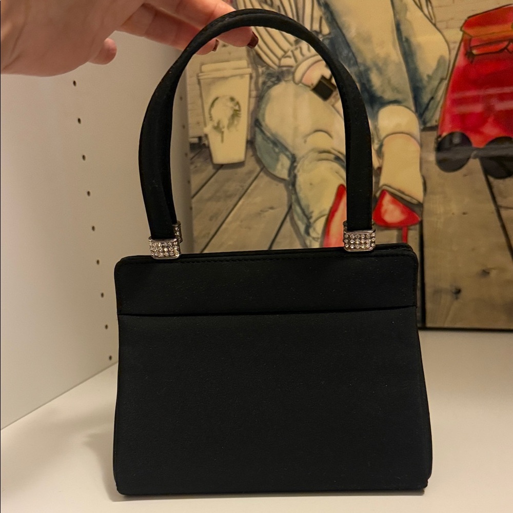 Chic Black Shoulder Bag with Elegant Accents